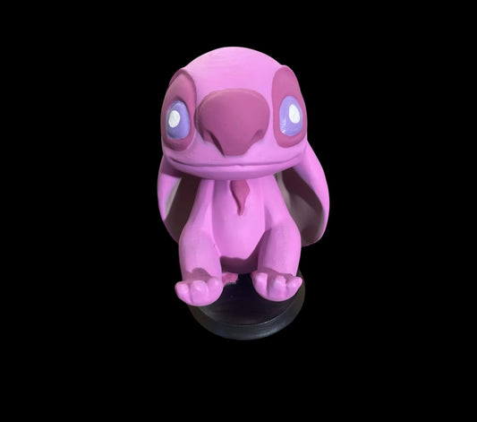 Pink Alien control holder.